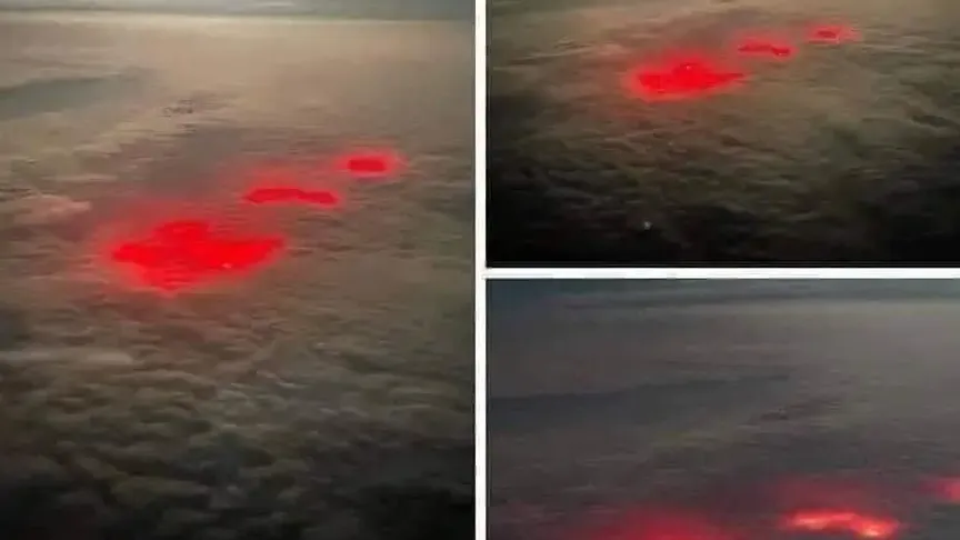 červená záře prosvítá skrz mraky